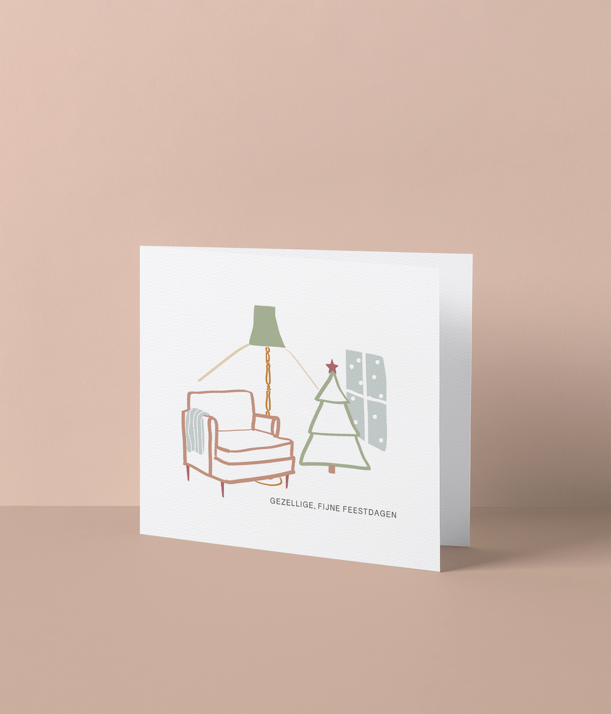 Kerstkaart met lijntekening van leunstoel en kerstboom